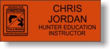 (image for) Fish & Wildlife Hunter Education Black Logo Orange Instructor Badge 2 Line Name