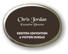 (image for) Sikeston Convention & Visitors Bureau Executive Oval Brown Silver Framed Badge